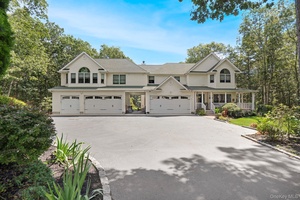 Diamond Dream Home in Manorville In ground, heated, saltwater pool, 5 car garage, bonus room and basement !