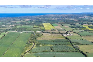 This rare property offers over 130 acres of scenic rolling hills with more than 3700 ft of river frontage.