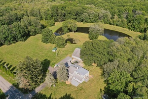 Privately situated on 4 acres and at the end of a quiet cul de sac, find this custom contemporary.