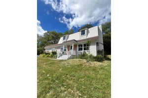 Renovated 4 Bedroom Home with Lake Rights on One Acre.