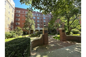 A Gem in Forest Hills. Welcome to this rarely available corner apartment, a true gem within the highly sought after Forest Hills South community.