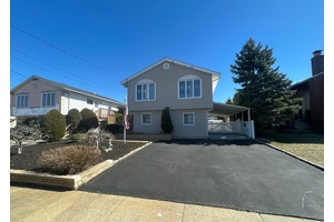 Outstanding and spacious waterfront raised ranch style home with 50 of frontage on a beautiful canal, 2 full bathrooms, fireplace, very large den area, and outstanding potential.