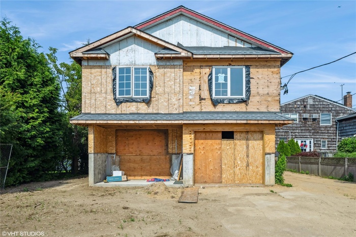 FRONT VIEW OF HOUSE