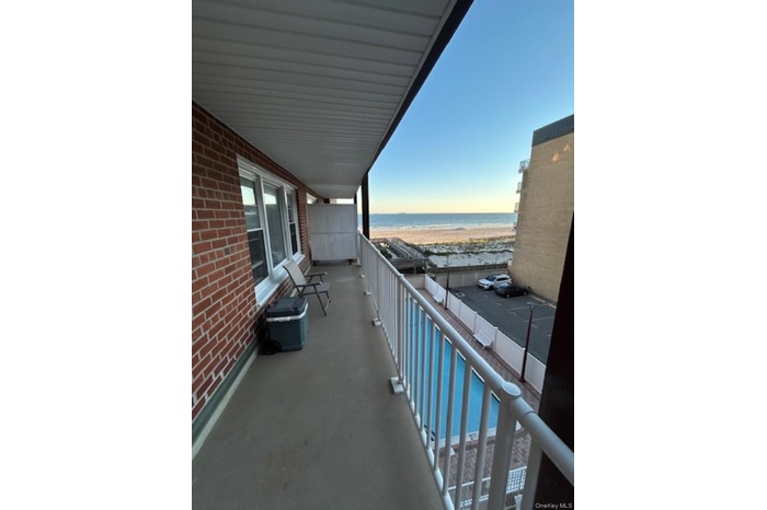 Balcony with ocean view, heated pool and beach