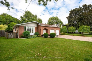 Charming All Brick Bungalow with Pool Oasis in the Heart of Newmarket !