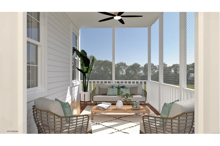 Sunroom / solarium featuring ceiling fan