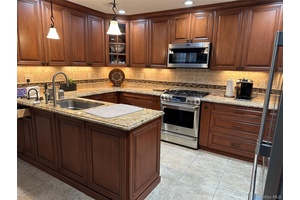 Welcome Home ! This two story townhouse is nestled in a gated community.