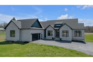 Welcome to 245 Mann Drive, an extraordinary 5 bedroom, 3.