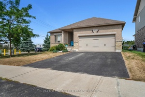 Charming all brick raised Bungalow on corner lot with deeded access to waterfront with dock !