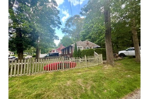 mint Quaint home with water views, marble floors, oak floors, 2 driveways corner house from both streets detached garage, central air, walk out basement, Great starter or finisher