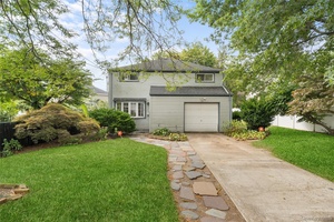 Welcome to this charming and spacious 4 bedroom Colonial style home !