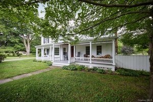 This picturesque four bedroom, three bath 1800's farmhouse has been lovingly restored and thoughtfully updated, blending timeless historic farmhouse charm with modern comfort, including fiber optic internet.