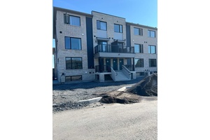 NEW TOWNHOUSE CORNER CONDO.