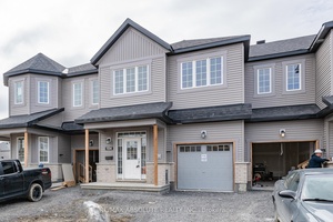 Beautiful home features an open concept main living area complete with a kitchen with island and granite countertops, stainless steel appliances, lots of natural light, vaulted ceilings and more.