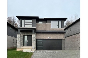 This modern 2 storey home, less than one year old, offers over 2, 600 sq.