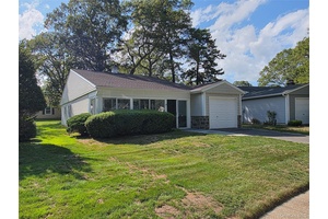 Tucked away in one of the area's most sought after 55 communities is this stunning 2 bedroom 2 full bath Huntington Model.