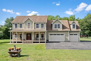 Stunning home on 1. 2 acres with amazing Brazilian Cherry floors !