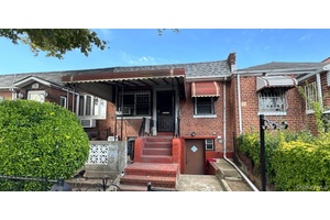 This Ranch Style Home Features 2 Bedrooms, Full Bath, Formal Dining Room and driveway parking.