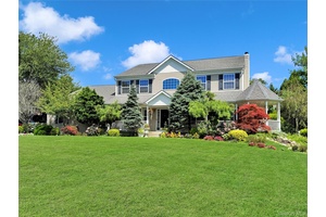 Spectacular Home In Manorville's Prestigious Pinewood Estates Which Offers Desirable East Moriches Schools !