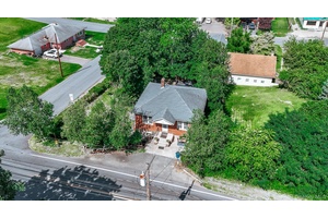 An outstanding opportunity awaits with this legal two family on a prime corner lot !