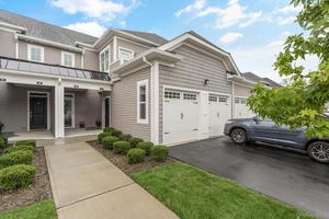 Sophisticated First Floor Living in the young and beautiful Gated 55 Community of The Seasons at Dix Hills.