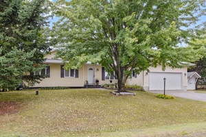 Set on a 20, 000 sq ft lot, this 3 1 bedroom, 3 bathroom bungalow sits in a safe, family friendly neighbourhood with mature trees and a new park.