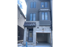 This beautiful a year new 3 storey end unit townhouse in Cambridge offers over 1, 500 sq ft of modern living space, featuring 3 spacious bedrooms and 1.