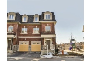 LARGE END UNIT TOWNHOUSE BACKING ON TO POND AND RAVINE.