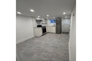 Discover this updated, bright, and modern apartment nestled on a beautiful tree lined street in South Riverdale, just steps from vibrant Queen Street East.