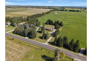 This property is situated on a spacious 1.