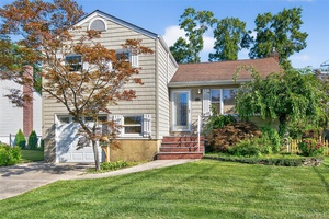 Welcome to this spacious split level home featuring three bedrooms and one full bath.