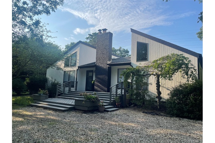 Front of property with a chimney