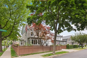 A truly exceptional home on prime City Island !