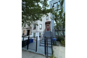 Beautiful four story, three family townhouse located in the heart of historic Stuyvesant Heights, close to Bushwick.