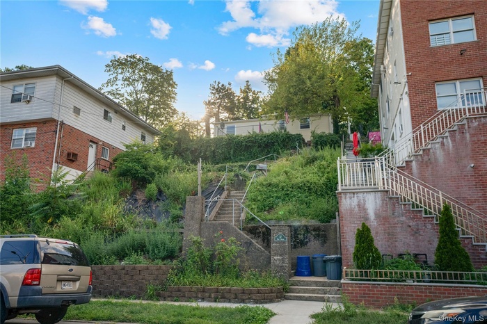 View of property's community featuring stairway