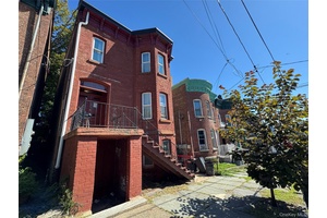 Detached Brick Three Family Home in the Heart of Newburgh, NY Welcome to this classic detached brick three family home, ideally located in the heart of Newburgh.
