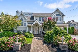 Welcome to 95 Washington Avenue, Islip Terrace a stunning split level home completely remodeled in 2009, designed for comfort, style, and entertaining.