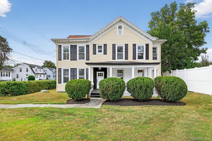 View of front of property featuring covered porch