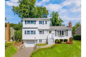 Newly renovated 5 bedroom, 2 bath Hi Ranch home in the North Shore School District.
