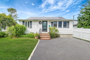 This 2 bedroom, 1 bath ranch features hardwood floors throughout and a spacious eat in kitchen.