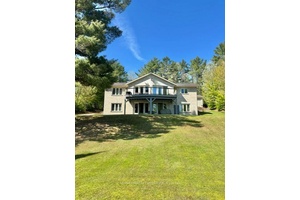 Gorgeous 3 bedroom home with eastern exposure and fantastic view on Baptiste Lake.