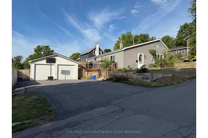 This quaint bungalow combines charm, comfort, and convenience in one inviting package.