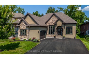 Showstopper ! This 2019 raised bungalow was custom built by the owners with all the high end finishes for their own enjoyment.