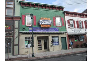 AAA LOCATION on BROADWAY in front of bus route !