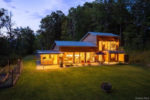 Built by true local artisans, this 2, 500 sq ft modern residence rests on 10 acres with a private walking path to the Coxing Kill creek.