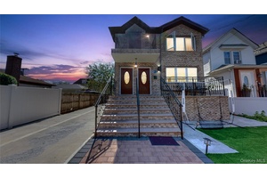 Welcome to this beautifully renovated two family home in a prime New York location !