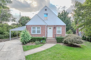Nestled on a quiet dead end street in the heart of Stewart Manor, this charming four bedroom residence combines modern updates with classic comfort.
