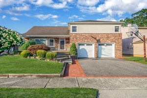 Welcome to 3357 Poplar St a beautifully updated residence blending modern luxury with timeless comfort.