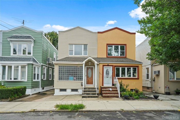View of front of home with stucco siding