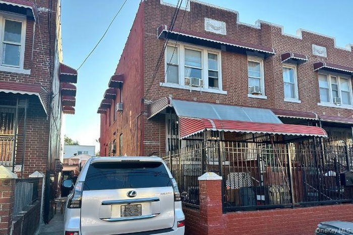 View of front of property with brick siding